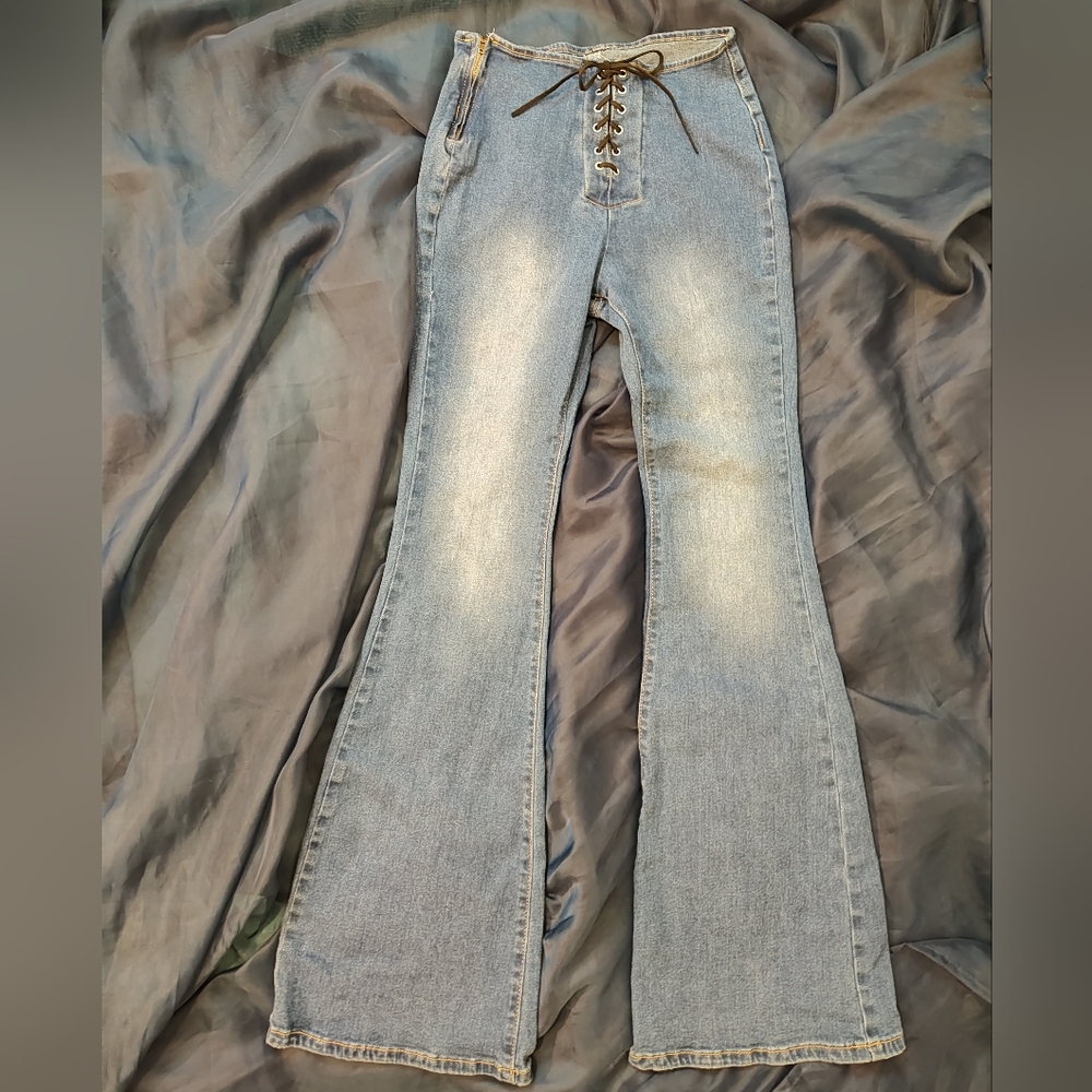 High waist flared leg jeans with front tie and side zipper